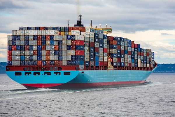Large cargo ship navigating ocean waters for maritime English training